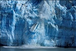 Series of 5 sequential images showing Ice calving from Hubbard Glacier, Alaska 3/5